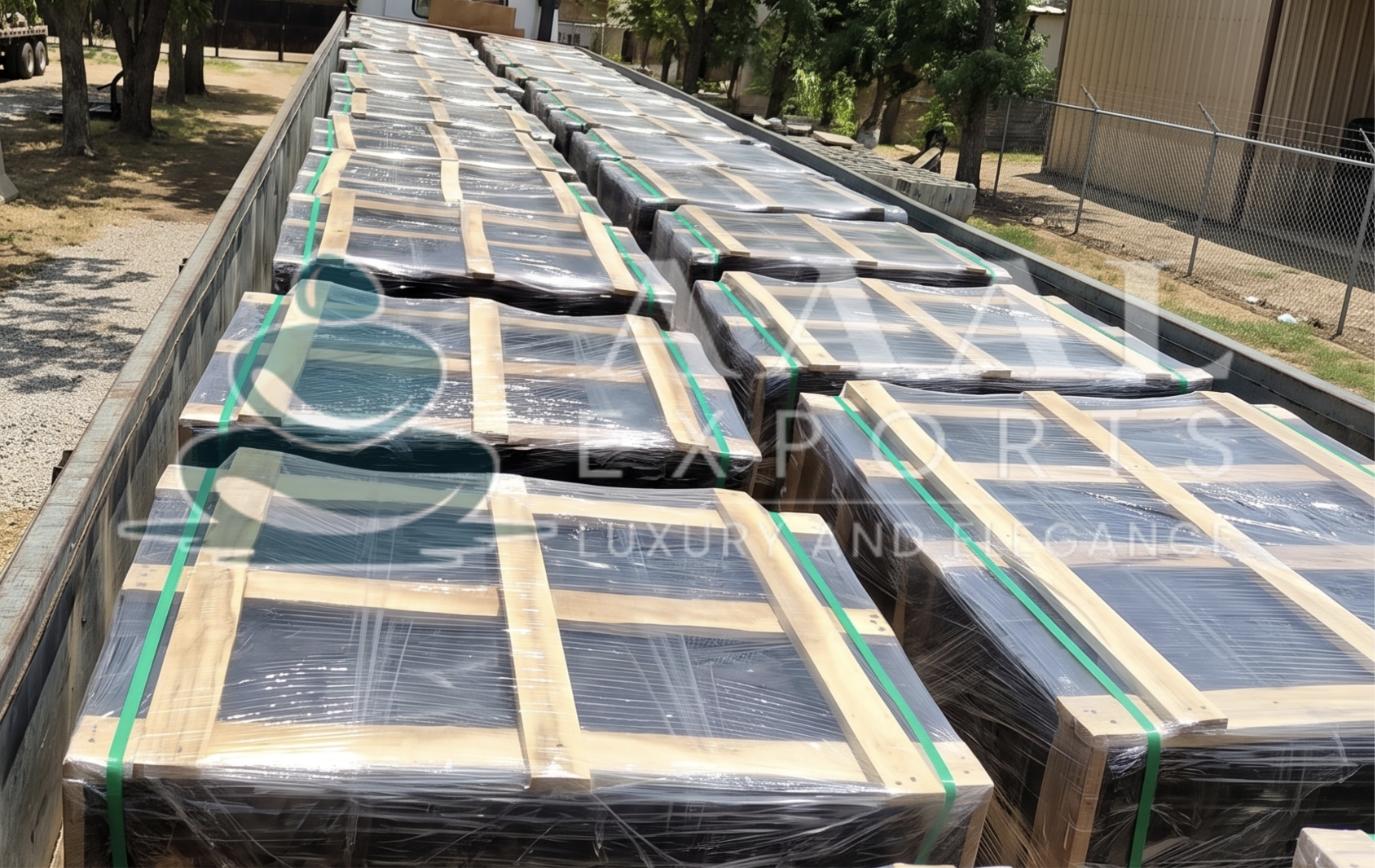 Export packing of green marble tiles in wooden crates loaded for shipment by natural stone manufacturers from India